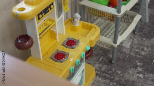 Wallpaper Mural Toy kitchen with tiny burners and shelves stands in playroom. Cozy setup helps children explore creativity through pretend cooking Torontodigital.ca