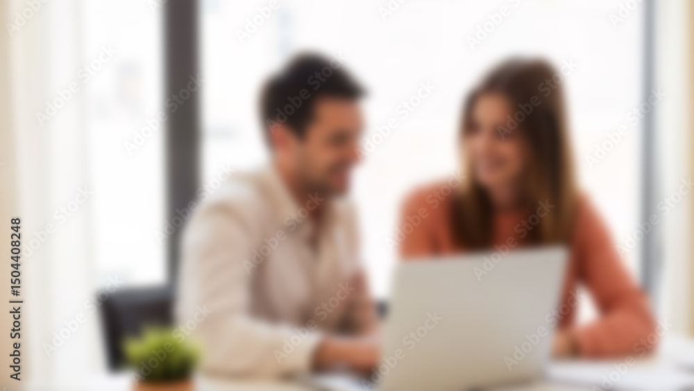 Blurred photo of professional meeting scene with two colleagues. Image suitable for business, teamwork, or office collaboration context. Blurred photo of professional meeting scene with two colleagues. Image suitable for business, teamwork, or office collaboration context.