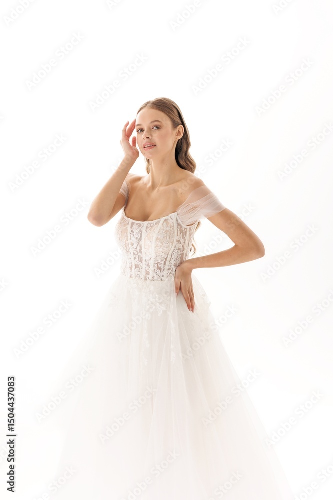 Elegant bride in a flowing white wedding dress poses gracefully against a soft background Elegant bride in a flowing white wedding dress poses gracefully against a soft background