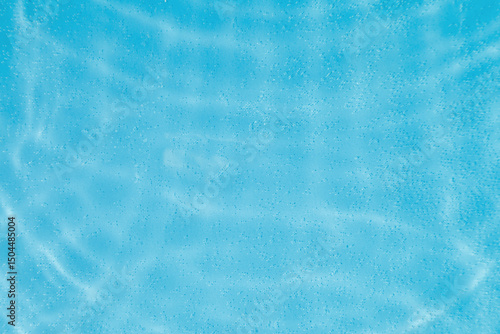 drops on water with circles on a blue background
