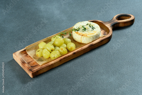 Fried cheese with grapes