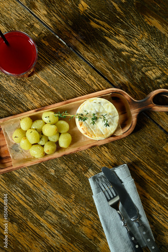 Fried cheese with grapes
