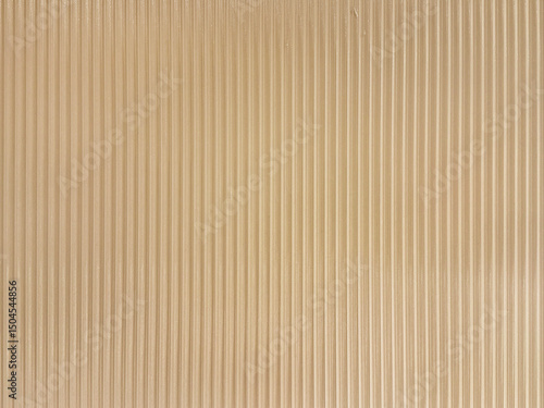 Fluted panel finished in bright beige metallic spray paint, a luxurious touch for seamless fluted panel background texture.