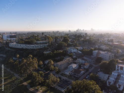 Drone View of Residential West Los Angeles with Hazy Skyline at Sunset