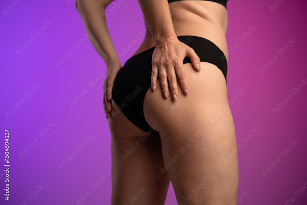 Woman in Black Underwear on Purple Gradient Background Woman in Black Underwear on Purple Gradient Background