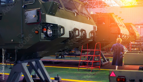 Manufacturing military vehicles at Wheel Tractor Plant facility in efficient production environment