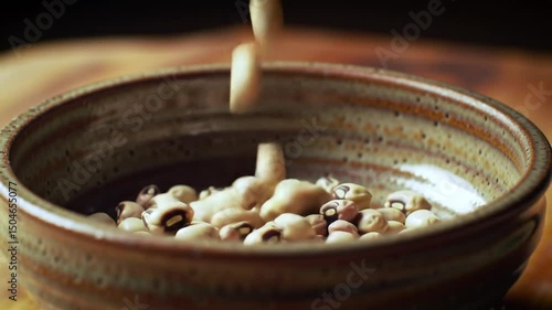 Black Eyed Peas Falling Into Rustic Bowl Food Preparation Concept
