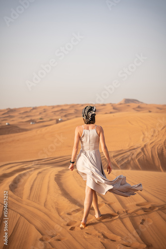 Wallpaper Mural Beautiful girls in a beautiful flowing dress in desert condition Torontodigital.ca
