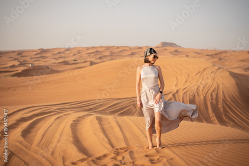 Wallpaper Mural Beautiful girls in a beautiful flowing dress in desert condition Torontodigital.ca