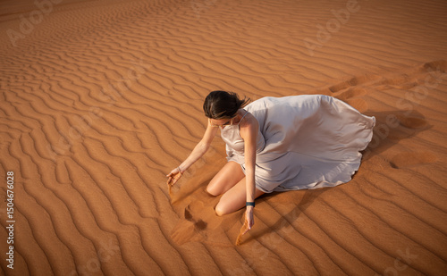 Wallpaper Mural Beautiful girls in a beautiful flowing dress in desert condition Torontodigital.ca