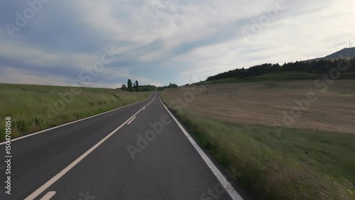 Peaceful Drive Through Sunny Natural Landscape