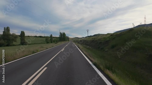 Peaceful Drive Through Sunny Natural Landscape