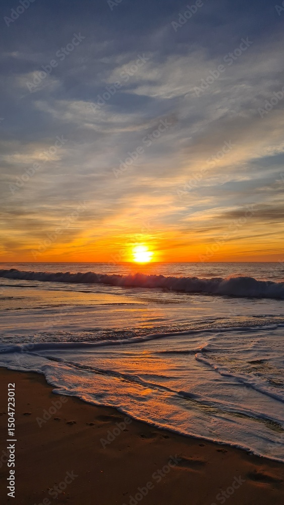 Fototapeta premium Coucher de soleil sur l'océan Atlantique (Presqu'île du Cap Ferret)