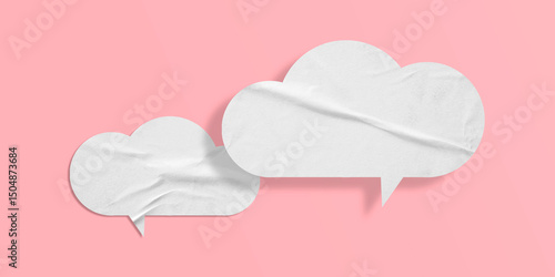 White crumpled speech bubble paper isolated on pink background