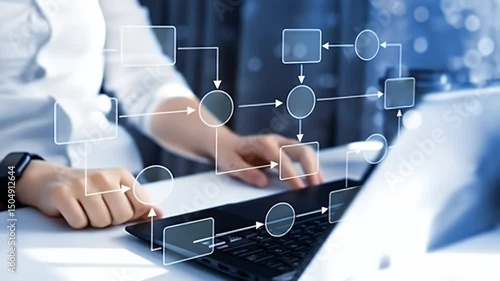 Hand Interacting with Digital Flowchart on Laptop Screen Displaying Process Automation in a Modern Corporate Setting With White and Blue Color Scheme