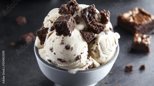 Deliciously Creamy Ice Cream with Brownie Chunks in a Bowl