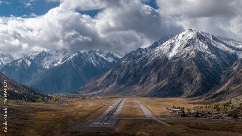 Bilde på lerret Airplane landing on remote mountainous runway scenic valley aerial view nature's