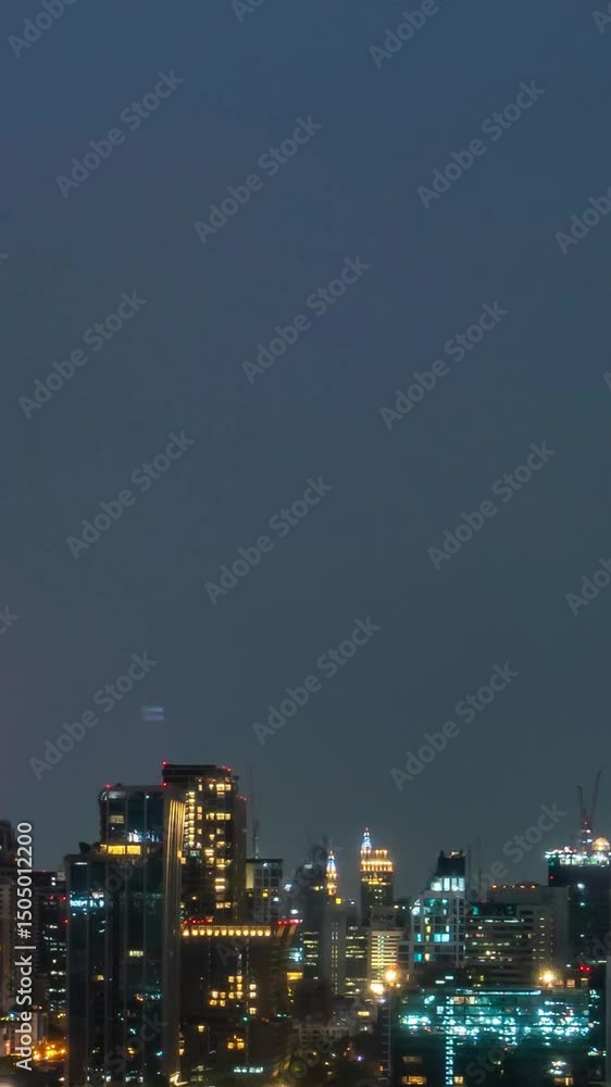 Time lapse night cityscape and high-rise buildings in metropolis city center . Downtown business district in panoramic view . Time lapse night cityscape and high-rise buildings in metropolis city center . Downtown business district in panoramic view .