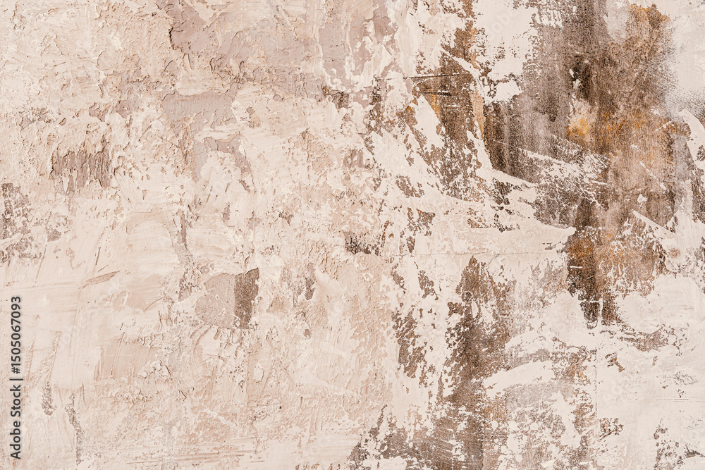 Fototapeta premium Textured wall surface with subtle tones of gray and beige in an indoor setting