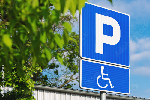 Billede på lærred Accessible parking space sign on the street
