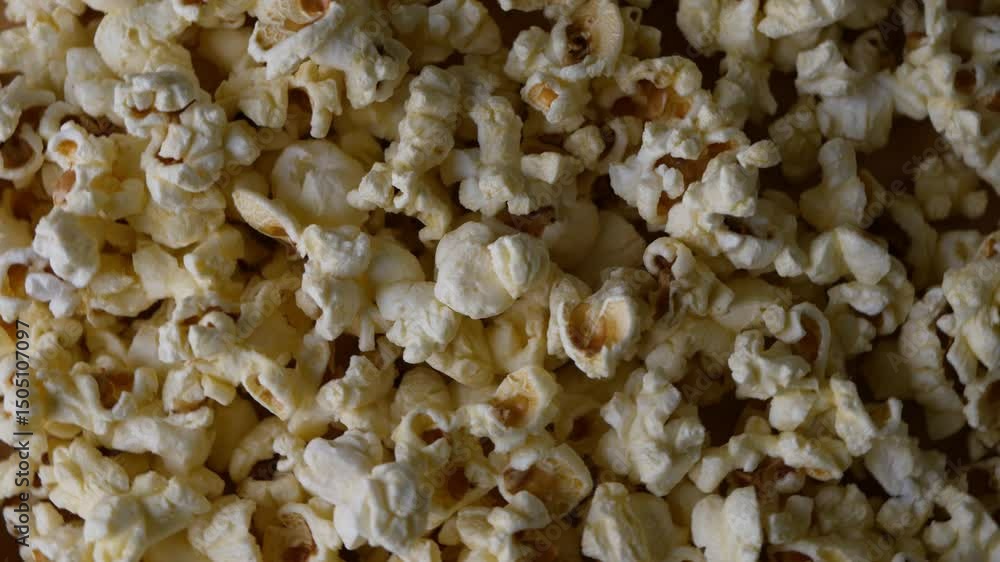 Butter salted popcorn on wooden table. Butter salted popcorn on wooden table.