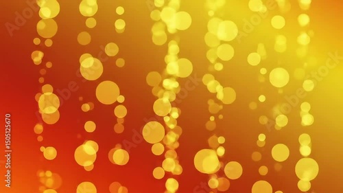 A vibrant background with a gradient transitioning from orange to yellow, overlaid with a pattern of golden, sparkling circles. These circles appear to be suspended or floating.