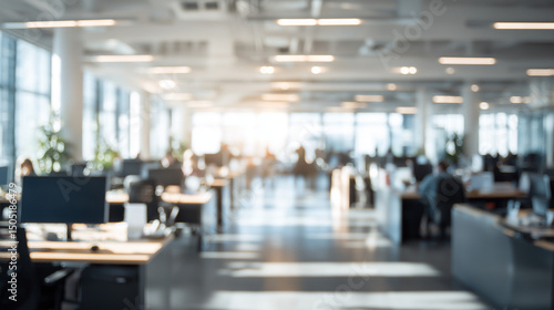 Wallpaper Mural Bright and spacious open-plan office interior with desks, monitors, and natural light flooding through large windows, creating a productive atmosphere. Torontodigital.ca