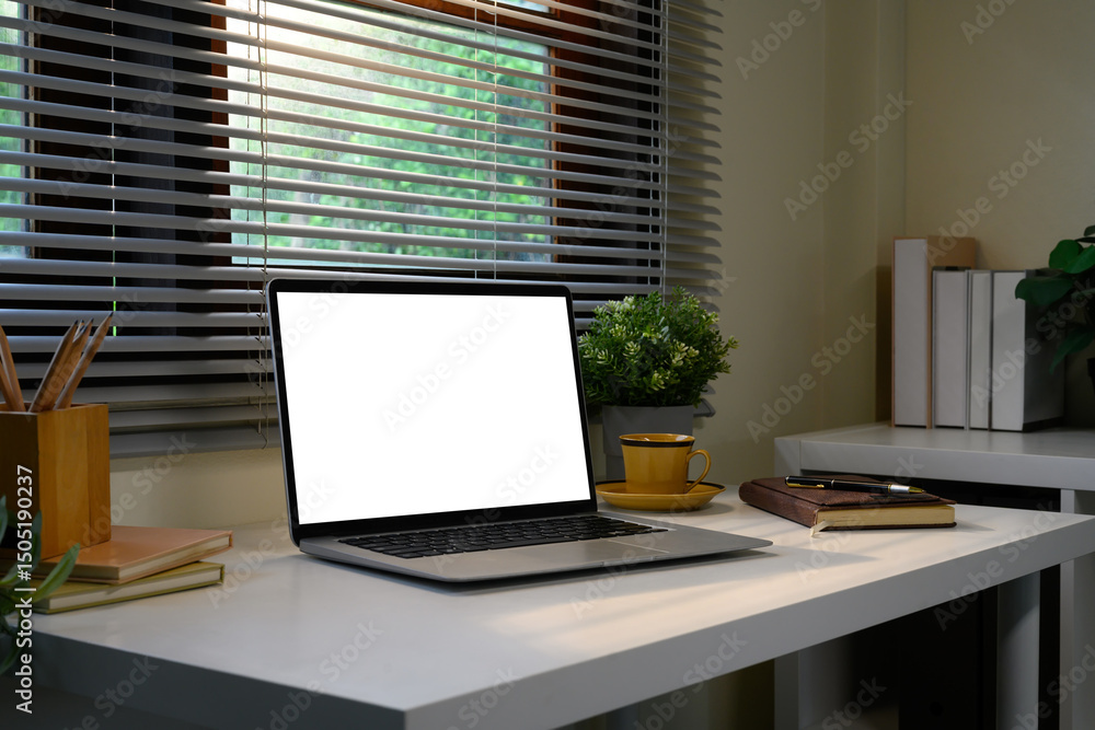 custom made wallpaper toronto digitalModern home office desk with a blank laptop screen, notebook, and plants by the window
