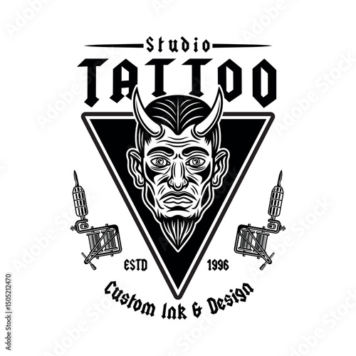 Vintage tattoo studio emblem with devil man head and tattoo machines. Classic monochrome vector illustration in retro style, perfect for tattoo designs, apparel prints, and branding