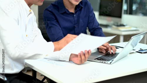Businessman and team analyzing financial statement Finance task. with smart phone and laptop and  tablet.