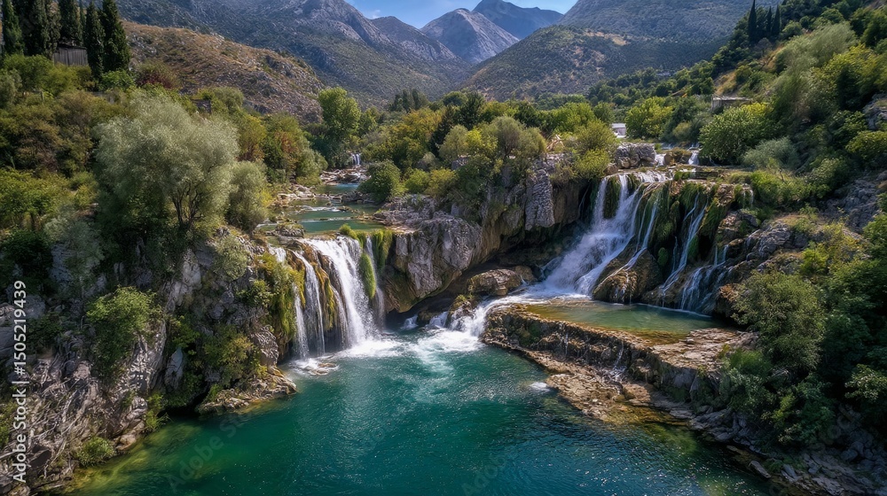 Fototapeta premium Aerial Breathtaking Waterfall with Tranquil Lake/壮大な滝と静かな湖の空撮4