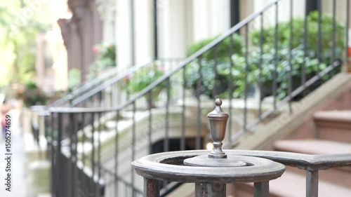 New York City townhouse building, Brooklyn Heights residential district, USA. Brownstone urban architecture, attached house. United States real estate, american property, apartments and homes in NYC.