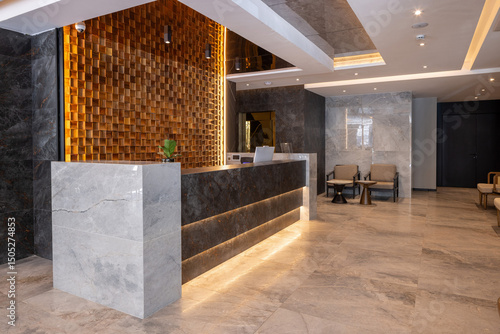 Modern hotel reception interior with decorative wooden wall