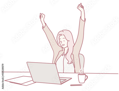 A joyful woman raises her arms in victory, celebrating her achievements while working on her laptop