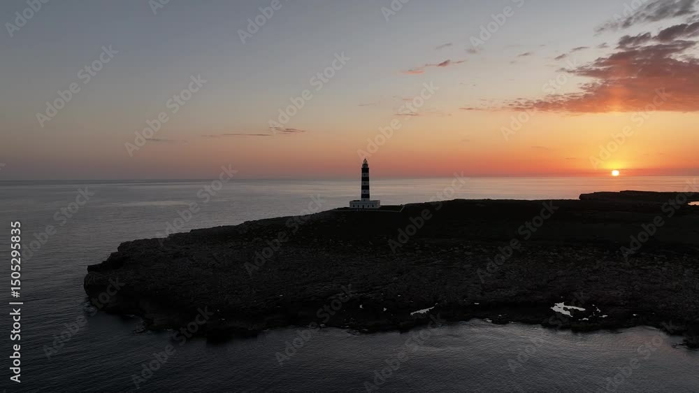 Atardecer en el Faro de la Isla del Aire en Menorca, Baleares, España Atardecer en el Faro de la Isla del Aire en Menorca, Baleares, España