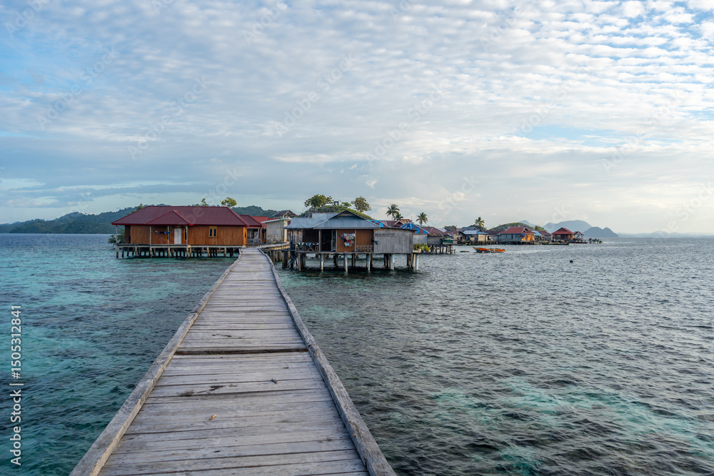 Naklejka premium Wooden jetty to Bajo village, Pulau Papan, Sulawesi, Indonesia