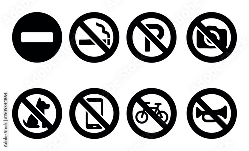 Set of eight circular prohibition signs with black icons