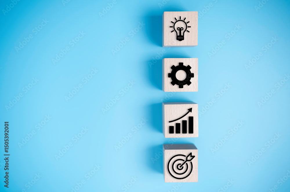 Business Strategy Concept Icons on Wooden Blocks Business Strategy Concept Icons on Wooden Blocks