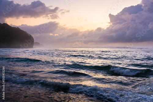 Beautiful sunrise over the sea at Bali Island. Beautiful view and colour of the sky. Magical holiday trip.