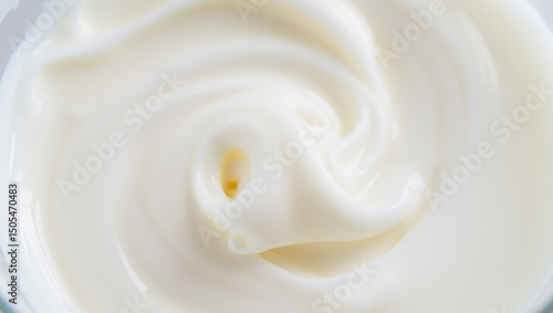 Close up of smooth and creamy white yogurt or cream texture