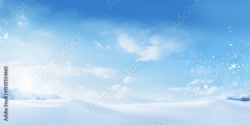 Fototapeta Naklejka Na Ścianę i Meble -  A serene winter landscape with a snow-covered hillside and a clear blue sky with a few scattered clouds.