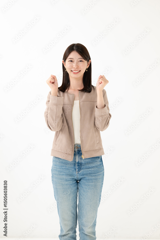 ガッツポーズをする女性 ガッツポーズをする女性