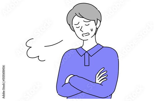 腕を組んでため息をついている若い男性