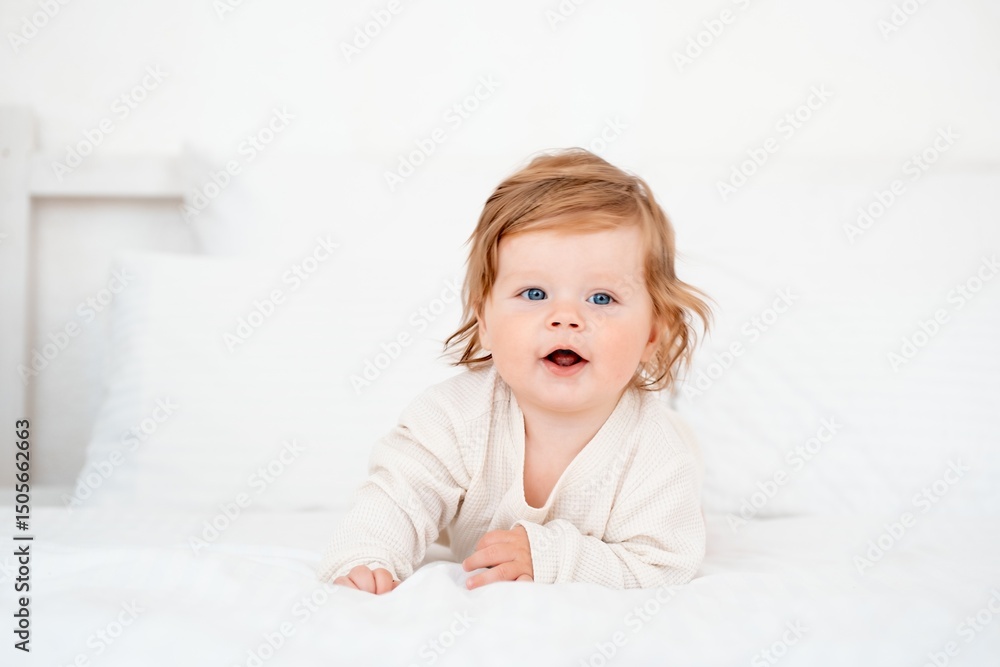A baby with red hair and blue eyes in a white bodysuit is smiling happily on the bed at home, a healthy happy cute newborn baby boy A baby with red hair and blue eyes in a white bodysuit is smiling happily on the bed at home, a healthy happy cute newborn baby boy