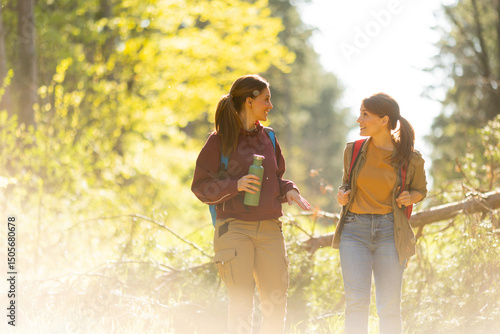 Friends enjoy a sunny hike ...
