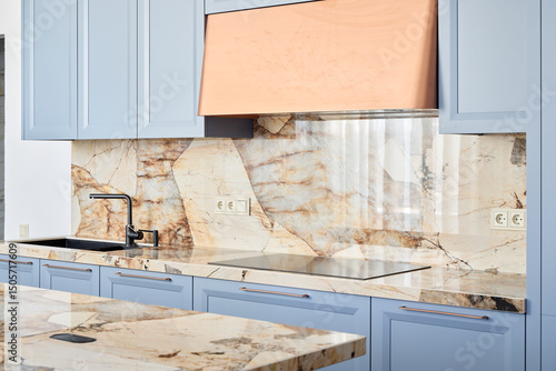 Elegant Kitchen Design Showcasing Stunning Marble Features and Beautiful Blue Cabinets