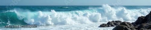 Powerful ocean waves crashing on a rocky shore, creating a dramatic display of nature's force Whitecaps, sea spray, and turbulent water showcase the raw energy of the sea , coastal, environment
