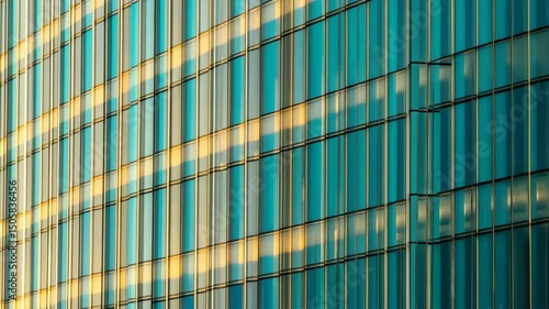 Wallpaper Mural Dynamic play of light on modern glass facade in urban setting Torontodigital.ca