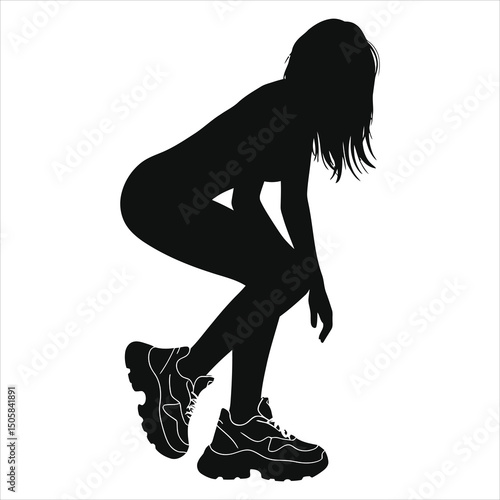 (chunky sneakers)Vector Silhouette of a Woman Wearing Trendy Sneakers/A bold silhouette of a woman crouching, wearing trendy chunky sneakers against a plain white background.