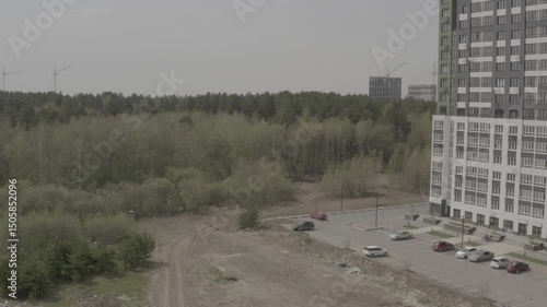 Tobolsk, drone, aerial photography, outskirts of the city, new multi-storey residential buildings, roads, cars, elite private sector, fields, forest, wild roads
